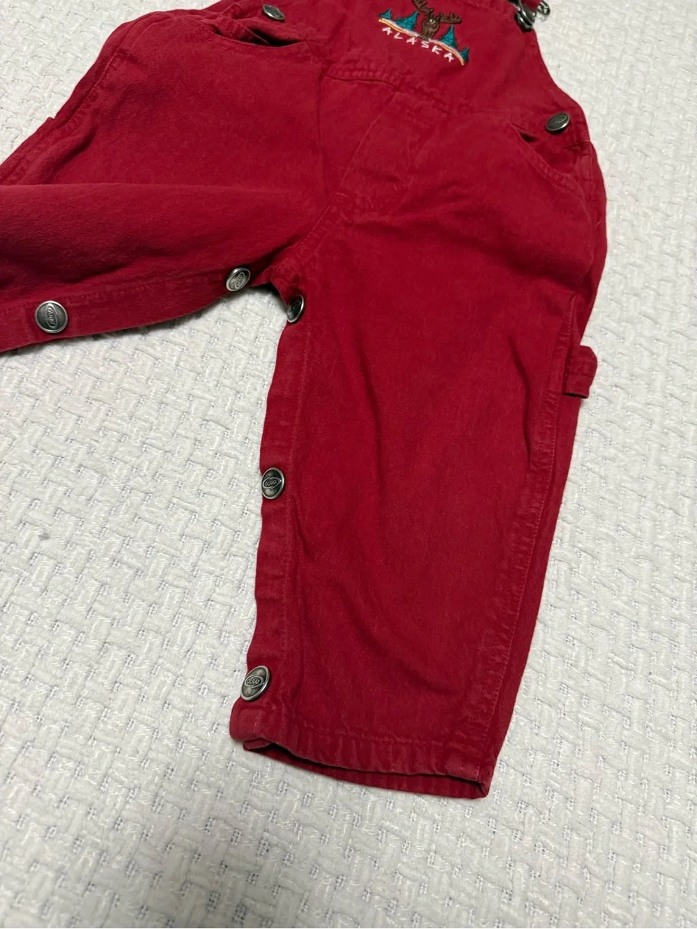 Red Alaska vintage overalls with embroidered moose and trees, 1 year.